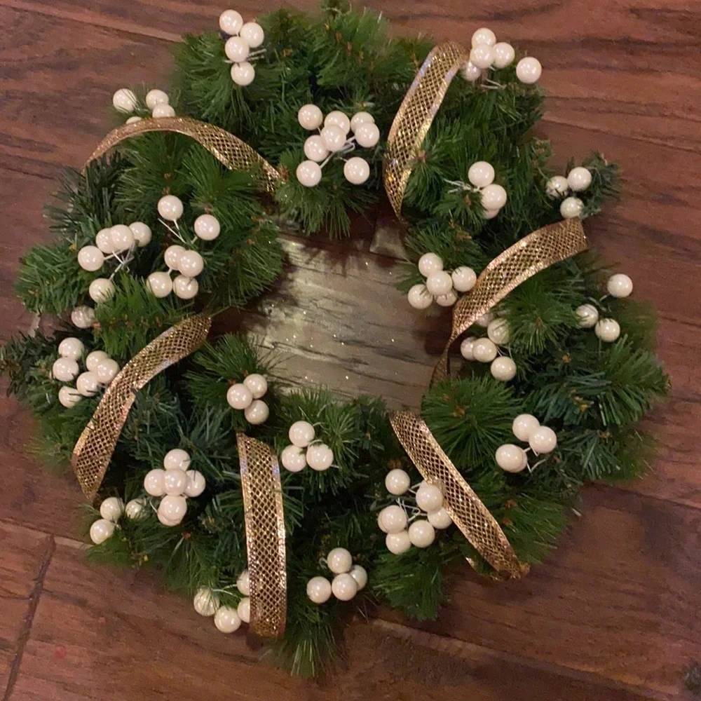 Green Holiday Wreath 15” across 10” wreath base includes gold ribbon pearl balls